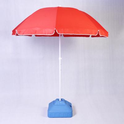 Red beach umbrella with tilt